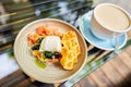 Potato waffles, Poached egg, avocado cream with salmon and egg . Healthy breakfast, protein. Restaurant dish. Royalty Free Stock Photo