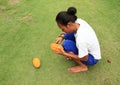 Girl cutting chocolate fruit