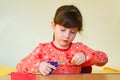 Girl cutting paper