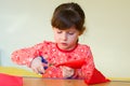 Girl cutting paper