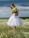 Girl in daisy field Royalty Free Stock Photo