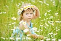 Girl on the daisy meadow Royalty Free Stock Photo