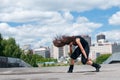 Girl dancing over urban landscape Royalty Free Stock Photo