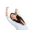 Girl dancing to the beat with headphones.