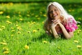 Girl on dandelion field