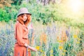 Girl on dandelion on green field. Royalty Free Stock Photo