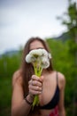 Girl with dandelion on green field Royalty Free Stock Photo