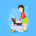 Girl washing cute dog.