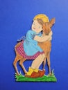 Girl and deer, wood carving