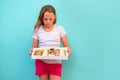 Girl Delivering The Diverse Sweets In A Tray To The Table. Royalty Free Stock Photo