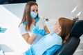 Girl in a dental chair at reception of female orthodontist Royalty Free Stock Photo