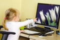 Girl at desktop computer Royalty Free Stock Photo