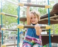 Girl developing dexterity at playground