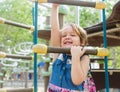 Girl developing dexterity at playground