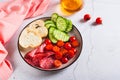 Girl dinner of smoked meats, vegetables and bread on a plate on the table