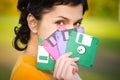 Girl with diskettes Royalty Free Stock Photo