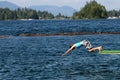 Girl diving into lake