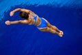 Girl diving in pool -3 Royalty Free Stock Photo