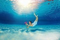 Girl diving in the pool