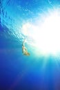 Girl diving under the sea Royalty Free Stock Photo