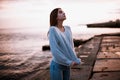 Girl in a sweater near the sea Royalty Free Stock Photo