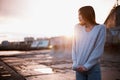 Girl in a sweater near the sea Royalty Free Stock Photo