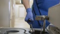 Girl doctor carries a radioactive capsule for the installation of an MRI