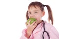 Girl, a doctor, the child, apple Royalty Free Stock Photo