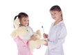 Girl, a doctor, the child, rabbit toy