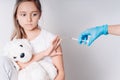 The girl does not want to be vaccinated. Against vaccination. Bad vaccine. Girl holds hand near face protest against vaccine next Royalty Free Stock Photo