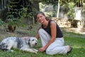 Girl with a dog at the animal shelter