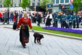 The girl and dog at norwegian constitution day during parade