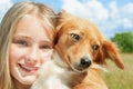Girl and dog outdoors Royalty Free Stock Photo