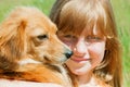 Girl and dog outdoors Royalty Free Stock Photo