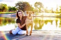 Girl and Dog at Park Sunflare