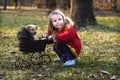 Girl with dog and pram Royalty Free Stock Photo