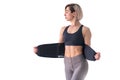 Girl doing fitness back belt slimming isolated on white background