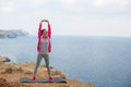 Girl doing gymnastics in the morning on the Beach Ocean Royalty Free Stock Photo