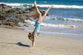 Girl doing hand stand Royalty Free Stock Photo