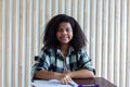 Girl is doing homework in the Classroom. Back to school! Cute industrious children are sitting at desks indoors. Kids are learning Royalty Free Stock Photo