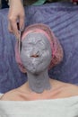 Girl doing lifting with Alginate Peel-Off Powder facial Mask