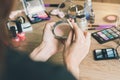 Girl doing makeup on dressing table Royalty Free Stock Photo