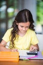 Girl doing math homework Royalty Free Stock Photo