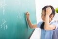 girl doing math problems on the chalkboard Royalty Free Stock Photo