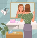 Girl doing morning routine in the bathroom. Woman stands with a syringe to inject into the face