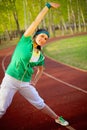 Girl doing sport exercises summer morning