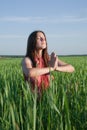 Girl doing yoga against nature Royalty Free Stock Photo