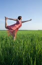 Girl doing yoga against nature during sunset Royalty Free Stock Photo