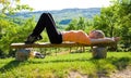 Girl doing yoga outdoors Royalty Free Stock Photo