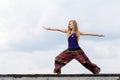 Women doing yoga, Warrior Pose Royalty Free Stock Photo